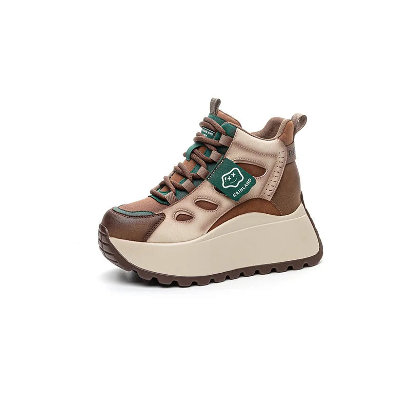 Brown and beige genuine leather sneaker with brand logo on a white background